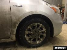 Installing a set of spacers to increase the ground clearance Toyota Prius Lift Kits (leveling kits and coil spring spacer\strut spacer)