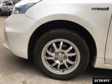 Installing a set of spacers to increase the ground clearance Toyota Prius Lift Kits (leveling kits and coil spring spacer\strut spacer)