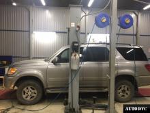 Installing a set of spacers to increase the ground clearance Toyota Sequoia I Lift Kits (leveling kits and coil spring spacer\strut spacer)