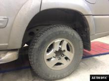 Installing a set of spacers to increase the ground clearance Toyota Sequoia I Lift Kits (leveling kits and coil spring spacer\strut spacer)