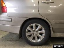 Installing a set of spacers to increase the ground clearance Suzuki Liana Lift Kits (leveling kits and coil spring spacer\strut spacer)