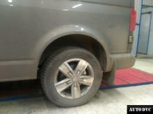 Installing a set of spacers to increase the ground clearance Volkswagen Multivan Lift Kits (leveling kits and coil spring spacer\strut spacer)