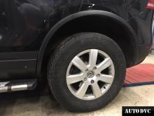Installing a set of spacers to increase the ground clearance Volkswagen Touareg Lift Kits (leveling kits and coil spring spacer\strut spacer)