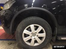 Installing a set of spacers to increase the ground clearance Volkswagen Touareg Lift Kits (leveling kits and coil spring spacer\strut spacer)