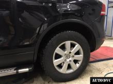 Installing a set of spacers to increase the ground clearance Volkswagen Touareg Lift Kits (leveling kits and coil spring spacer\strut spacer)