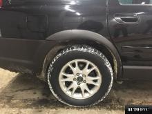 Installing a set of spacers to increase the ground clearance Volvo XC70 Lift Kits (leveling kits and coil spring spacer\strut spacer)