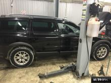 Installing a set of spacers to increase the ground clearance Volvo XC70 Lift Kits (leveling kits and coil spring spacer\strut spacer)