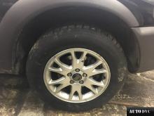 Installing a set of spacers to increase the ground clearance Volvo XC70 Lift Kits (leveling kits and coil spring spacer\strut spacer)