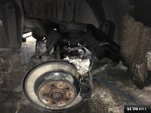 Installing a set of spacers to increase the ground clearance Volvo XC70 Lift Kits (leveling kits and coil spring spacer\strut spacer)