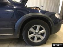 Installing a set of spacers to increase the ground clearance Volvo XC70 Lift Kits (leveling kits and coil spring spacer\strut spacer)