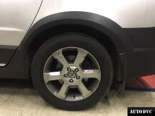 Installing a set of spacers to increase the ground clearance Volvo XC70 II Lift Kits (leveling kits and coil spring spacer\strut spacer)