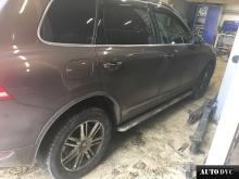 Installing a set of spacers to increase the ground clearance Volkswagen Touareg II Lift Kits (leveling kits and coil spring spacer\strut spacer)