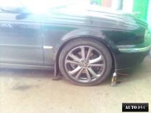Installing a set of spacers to increase the ground clearance Jaguar X-Type Lift Kits (leveling kits and coil spring spacer\strut spacer)