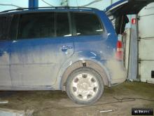 Installing a set of spacers to increase the ground clearance Volkswagen Touran Lift Kits (leveling kits and coil spring spacer\strut spacer)