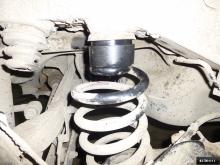 Installing a set of spacers to increase the ground clearance Nissan X-trail Lift Kits (leveling kits and coil spring spacer\strut spacer)
