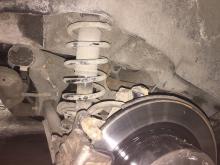 Installing a set of spacers to increase the ground clearance Mitsubishi ASX Lift Kits (leveling kits and coil spring spacer\strut spacer)